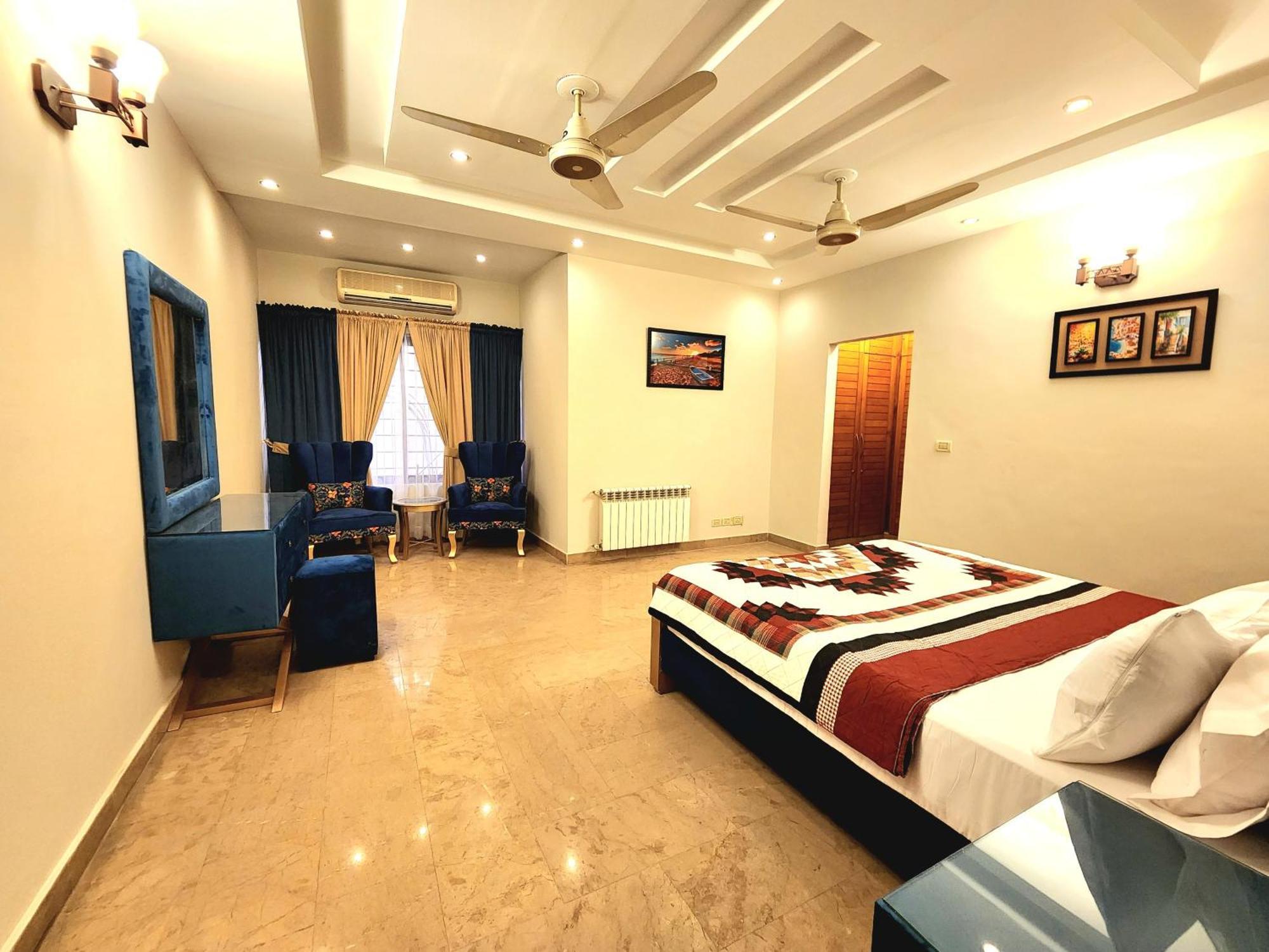 Luxurious Landing Apartments & Suites Bahria Town Rawalpindi Quarto foto